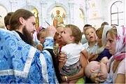Первое причастие в новом храме
